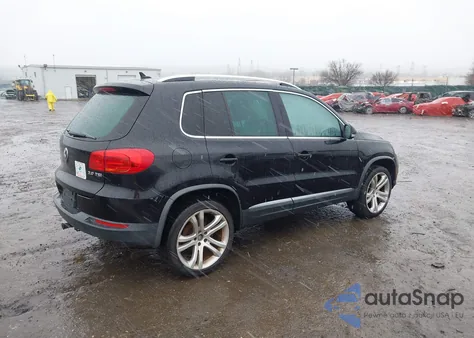 2012 Volkswagen Tiguan Sel из США, поврежденный, VIN WVGAV7AX7CW583304